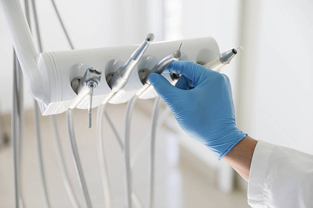 Professional Dental Veneers technician working in Greenville, RI